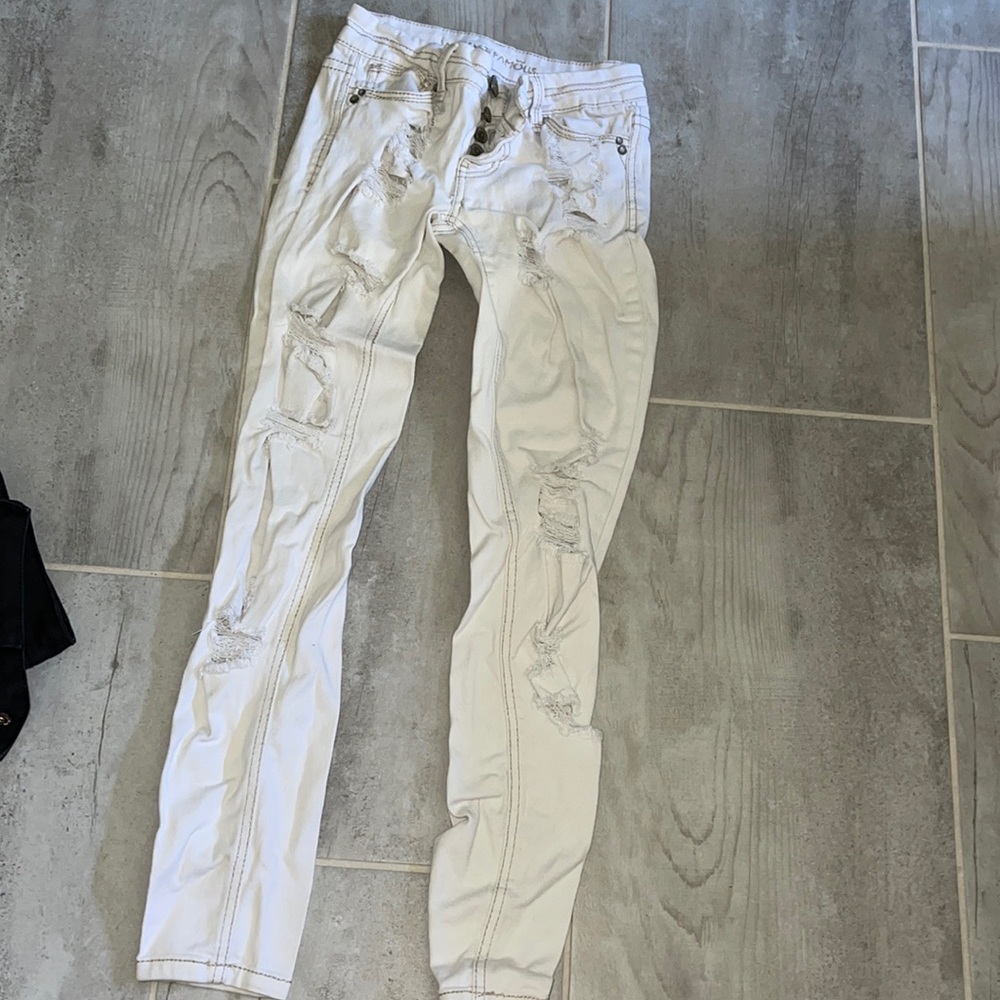 White ripped jeans